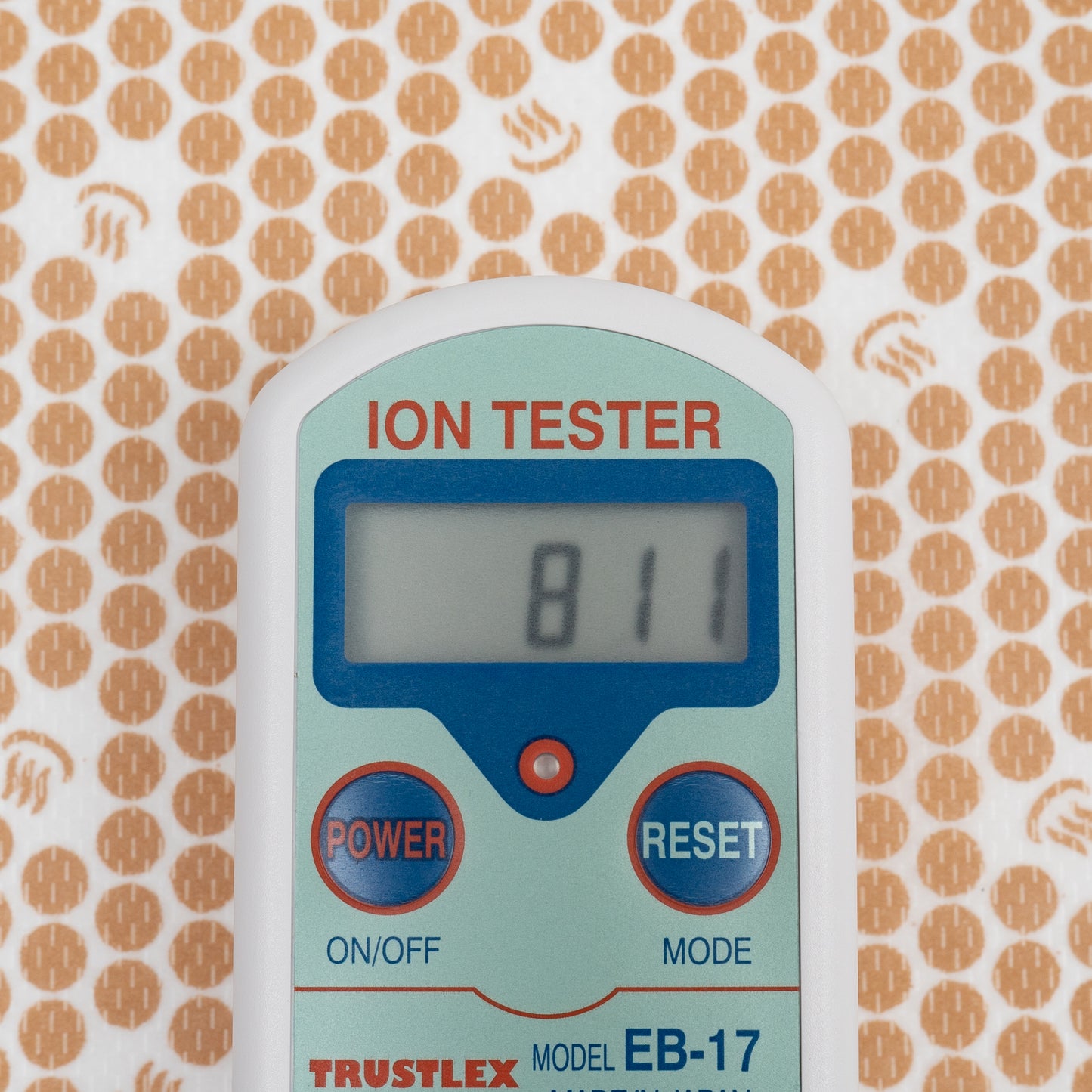 Hormesis (negative ion) nonwoven cloth